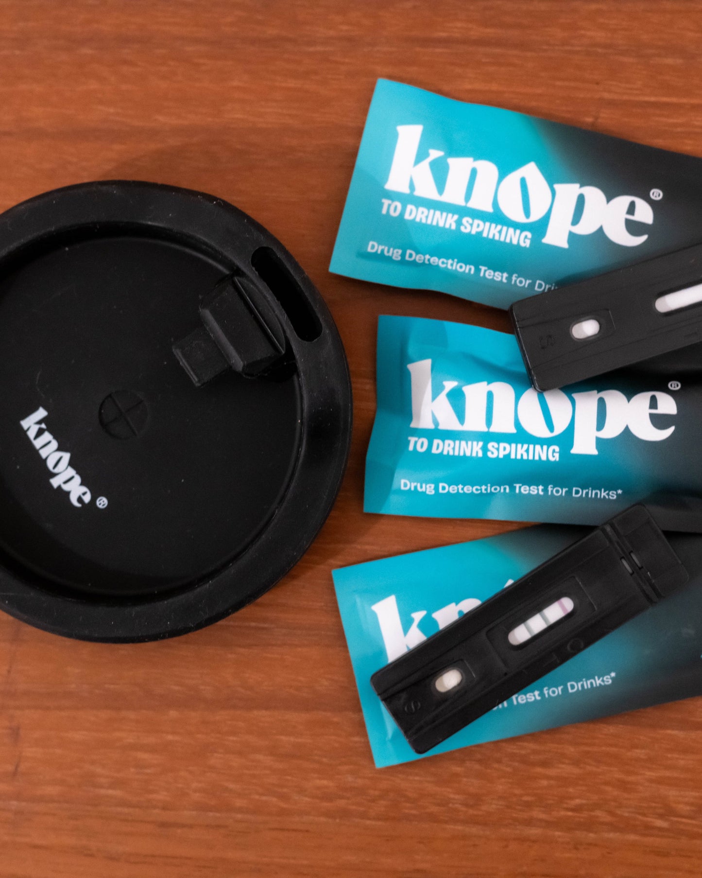 Three Knope drug detection tests and one knope reusable cover to prevent drink spiking